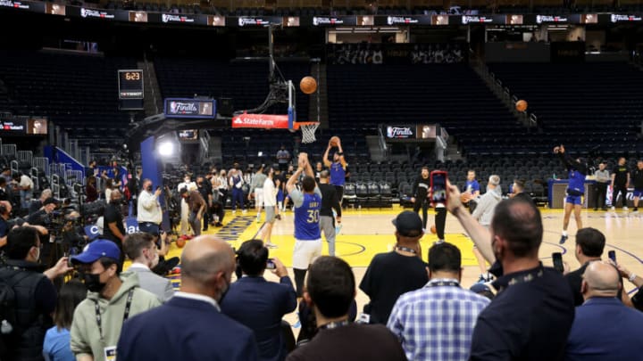 SAN FRANCISCO, CALIFORNIA - JUNE 01: Stephen Curry #30 of the Golden State Warriors takes a shot during media day prior to the start of the NBA Finals at Chase Center on June 01, 2022 in San Francisco, California. The Golden State Warriors will play the Boston Celtics in Game 1 of the NBA Finals on June 2, 2022. NOTE TO USER: User expressly acknowledges and agrees that, by downloading and/or using this photograph, User is consenting to the terms and conditions of the Getty Images License Agreement. (Photo by Ezra Shaw/Getty Images)