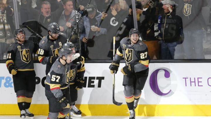 LAS VEGAS, NV – DECEMBER 19: Vegas Golden Knights players celebrate after Vegas Golden Knights defenseman Shea Theodore (27) scores the winning goal during the third period of a regular season NHL game between the Tampa Bay Lightning and the Vegas Golden Knights at T-Mobile Arena on Tuesday, Dec. 19, 2017, in Las Vegas. The Vegas Golden Knights would defeat the Tampa Bay Lightning 4-3. (Photo by: Marc Sanchez/Icon Sportswire via Getty Images)