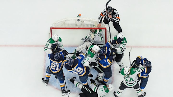 ST. LOUIS, MO - APRIL 27: St. Louis Blues and Dallas Stars players tussle in Game Two of the Western Conference Second Round during the 2019 NHL Stanley Cup Playoffs at Enterprise Center on April 27, 2019 in St. Louis, Missouri. (Photo by Scott Rovak/NHLI via Getty Images) ST. LOUIS, MO - APRIL 27: St. Louis Blues and Dallas Stars players tussle in Game Two of the Western Conference Second Round during the 2019 NHL Stanley Cup Playoffs at Enterprise Center on April 27, 2019 in St. Louis, Missouri. (Photo by Scott Rovak/NHLI via Getty Images)