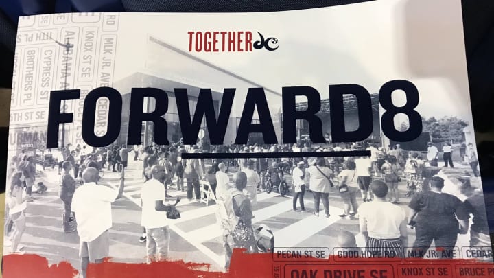 The front of the Washington Mystics cheer card for August 8 commemorating the FORWARD8 initiative. The team gives fans a different cheer card at every home game.