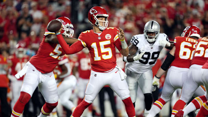 KANSAS CITY, MISSOURI - OCTOBER 10: Patrick Mahomes #15 of the Kansas City Chiefs passes during the 1st half of the game against the Las Vegas Raiders at Arrowhead Stadium on October 10, 2022 in Kansas City, Missouri. (Photo by Jason Hanna/Getty Images)