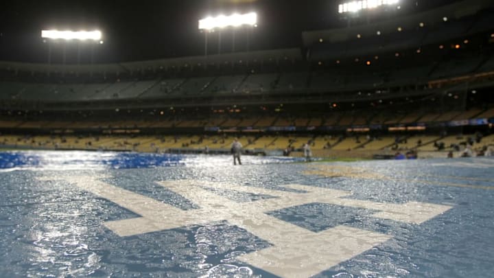 LOS ANGELES, CA - APRIL 02: The Los Angeles Dodgers logo is seen soaked with rain during a rain delay of the game against the San Francisco Giants on April 2,2008 at Dodger Stadium in Los Angeles,California. (Photo by Harry How/Getty Images)