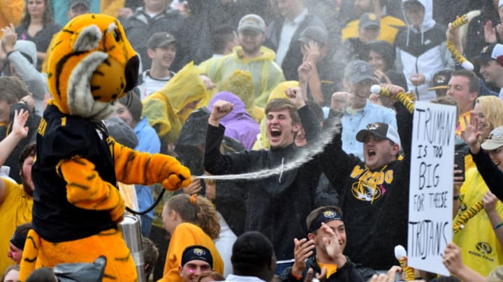 COLUMBIA, MISSOURI - OCTOBER 05: Truman the Tiger the Missouri Tigers mascot sprays water on fans during a game against the Troy Trojans in the first quarter at Faurot Field/Memorial Stadium on October 05, 2019 in Columbia, Missouri. (Photo by Ed Zurga/Getty Images)