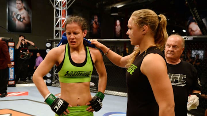 LAS VEGAS, NV - JUNE 6: (L-R) Shayna Baszler is consoled by coach Ronda Rousey after being submitted by Julianna Pena (not pictured) in their preliminary fight during filming of season eighteen of The Ultimate Fighter on June 6, 2013 in Las Vegas, Nevada. (Photo by Al Powers/Zuffa LLC/Zuffa LLC via Getty Images)