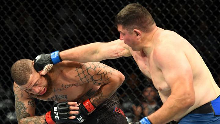 CHICAGO, ILLINOIS - JUNE 09: (R-L) Chris De La Rocha punches Rashad Coulter in their heavyweight fight during the UFC 225 event at the United Center on June 9, 2018 in Chicago, Illinois. (Photo by Josh Hedges/Zuffa LLC/Zuffa LLC via Getty Images)