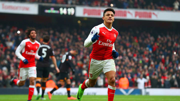 LONDON, ENGLAND - FEBRUARY 11: Alexis Sanchez of Arsenal celebrates scoring his side's second goal from the penalty spot during the Premier League match between Arsenal and Hull City at Emirates Stadium on February 11, 2017 in London, England. (Photo by Clive Rose/Getty Images)