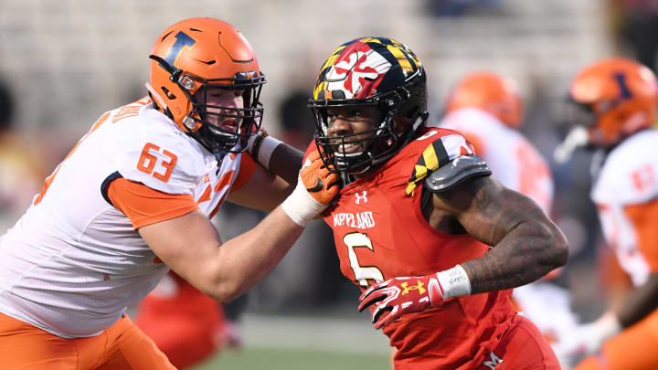 COLLEGE PARK, MD – OCTOBER 27: Jesse Aniebonam #6 of the Maryland Terrapins tries to get around Alex Palczewski #63 of the Illinois Fighting Illini during a college football game at Capitol One Field at Maryland Stadium on October 27, 2018 at College Park, Maryland. (Photo by Mitchell Layton/Getty Images)