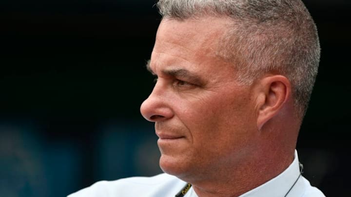KANSAS CITY, MO - JUNE 12: Dayton Moore general manager of the Kansas City Royals watches batting practice prior to a game against the Cincinnati Reds at Kauffman Stadium on June 12, 2018 in Kansas City, Missouri. (Photo by Ed Zurga/Getty Images)