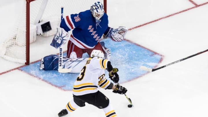 NEW YORK, NY - OCTOBER 27: Boston Bruins Left Wing Brad Marchand (63) works in front of New York Rangers Goalie Henrik Lundqvist (30) during an Eastern Conference matchup between the Boston Bruins and the New York Rangers on October 27, 2019, at Madison Square Garden in New York, NY. (Photo by David Hahn/Icon Sportswire via Getty Images)