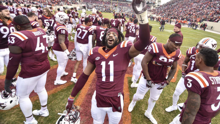 BLACKSBURG, VA – NOVEMBER 18: Defensive end Houshun Gaines #11 of the Virginia Tech Hokies sings the fight song following the game against the Pittsburgh Panthers at Lane Stadium on November 18, 2017 in Blacksburg, Virginia. (Photo by Michael Shroyer/Getty Images)