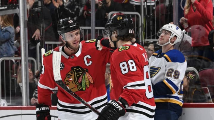 CHICAGO, IL - APRIL 03: Jonathan Toews #19 and Patrick Kane #88 of the Chicago Blackhawks celebrate after Toews scored against the St. Louis Blues in the first period at the United Center on April 3, 2019 in Chicago, Illinois. (Photo by Bill Smith/NHLI via Getty Images)
