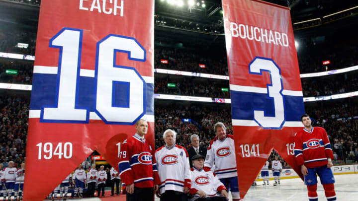 MONTREAL- DECEMBER 4: Former Montreal Canadiens Elmer Lach and Emile Bouchard are honored by having their numbers retired during the Centennial Celebration ceremonies prior to the NHL game between the Montreal Canadiens and Boston Bruins on December 4, 2009 at the Bell Centre in Montreal, Quebec, Canada. (Photo by Richard Wolowicz/Getty Images)