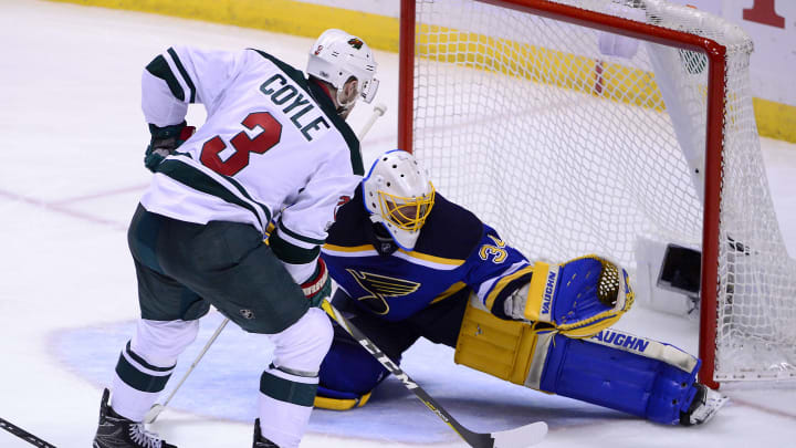 Apr 19, 2017; St. Louis, MO, USA; St. Louis Blues goalie Jake Allen (34) makes a save against Minnesota Wild center Charlie Coyle (3) during the third period in game four of the first round of the 2017 Stanley Cup Playoffs at Scottrade Center. The Wild won 2-0. Mandatory Credit: Jeff Curry-USA TODAY Sports