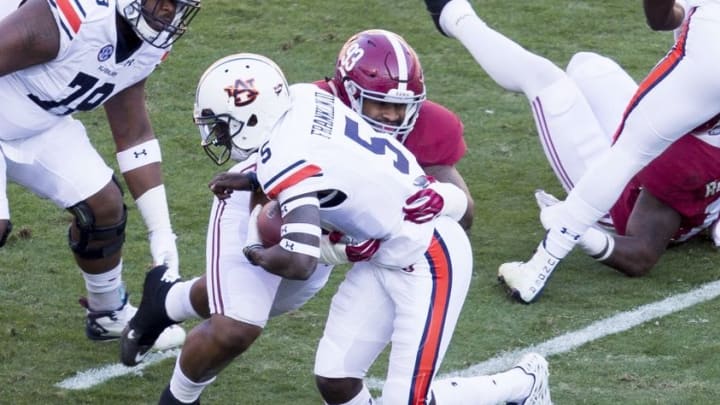 Nov 26, 2016; Tuscaloosa, AL, USA; Alabama Crimson Tide defensive lineman Jonathan Allen (93) hits Auburn Tigers quarterback John Franklin III (5) at Bryant-Denny Stadium. Mandatory Credit: Marvin Gentry-USA TODAY Sports