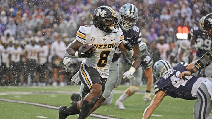 MANHATTAN, KS – SEPTEMBER 10: Running back Nathaniel Peat #8 of the Missouri Tigers runs with the ball against the Kansas State Wildcats during the first half at Bill Snyder Family Football Stadium on September 10, 2022 in Manhattan, Kansas. (Photo by Peter Aiken/Getty Images)