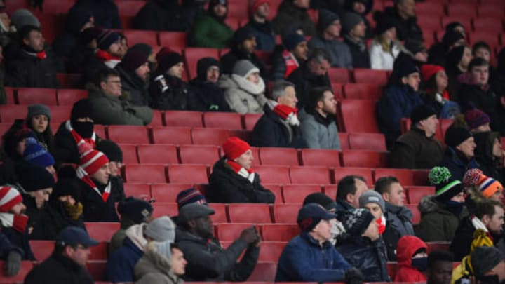 LONDON, ENGLAND – MARCH 01: Fans watch the match with empty seats all around during the Premier League match between Arsenal and Manchester City at Emirates Stadium on March 1, 2018 in London, England. (Photo by Shaun Botterill/Getty Images)