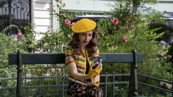 Emily in Paris. Lily Collins as Emily in episode 209 of Emily in Paris. Cr. Stéphanie Branchu/Netflix © 2021