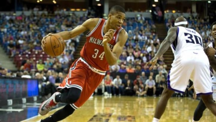 Mar 23, 2014; Sacramento, CA, USA; Milwaukee Bucks guard Giannis Antetokounmpo (34) drives in against the Sacramento Kings during the first quarter at Sleep Train Arena. Mandatory Credit: Kelley L Cox-USA TODAY Sports