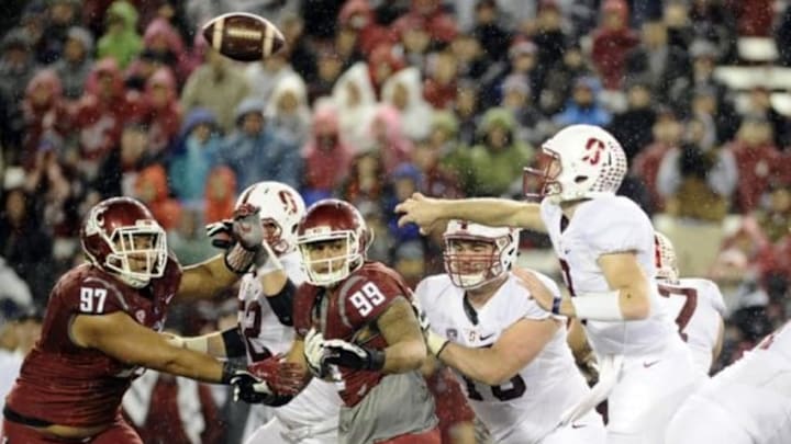 Oct 31, 2015; Pullman, WA, USA; Stanford Cardinal quarterback Kevin Hogan (8) trows a pass against the Washington State Cougars during the first half at Martin Stadium. Mandatory Credit: James Snook-USA TODAY Sports