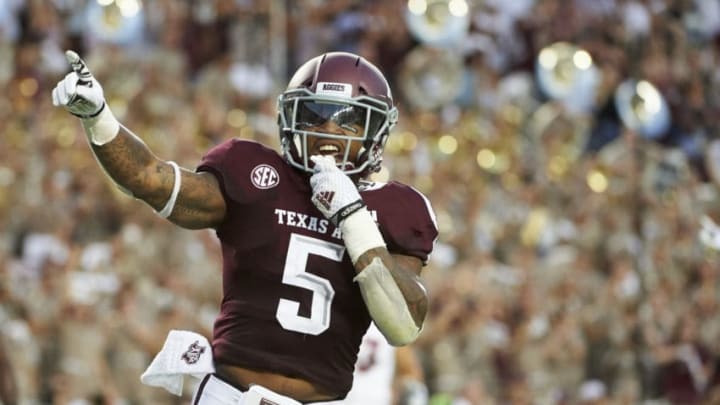 COLLEGE STATION, TX - AUGUST 30: Trayveon Williams #5 of the Texas A&M Aggies celebrates after scoring on a 73 yard touchdown run against the Northwestern State Demons during the first half of a football game at Kyle Field on August 30, 2018 in College Station, Texas. (Photo by Cooper Neill/Getty Images)