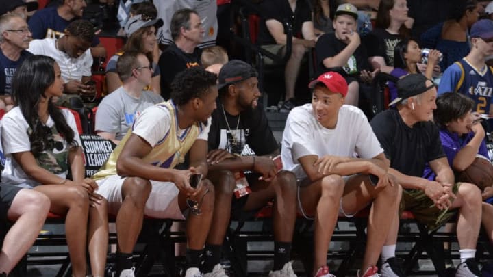 LAS VEGAS, NV - JULY 7: Donovan Mitchell, Royce O'Neale, and Dante Exum of the Utah Jazz speak during game between Portland Trail Blazers and Utah Jazz during the 2018 Las Vegas Summer League on July 7, 2018 at the Cox Pavilion in Las Vegas, Nevada. Copyright 2018 NBAE (Photo by David Dow/NBAE via Getty Images)