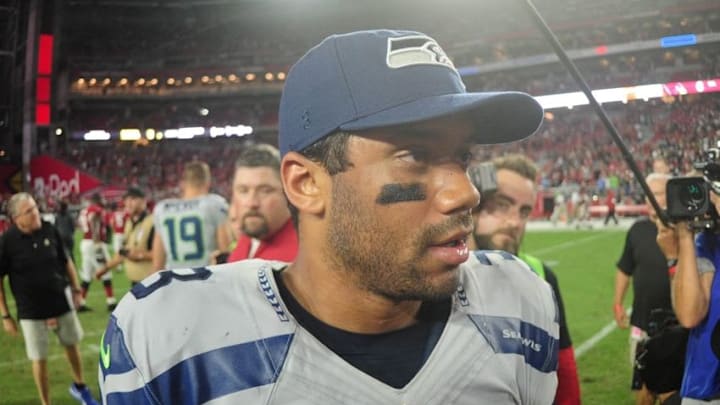 Oct 23, 2016; Glendale, AZ, USA; Seattle Seahawks quarterback Russell Wilson (3) looks on after tieing the Arizona Cardinals 6-6 in overtime at University of Phoenix Stadium. Mandatory Credit: Matt Kartozian-USA TODAY Sports