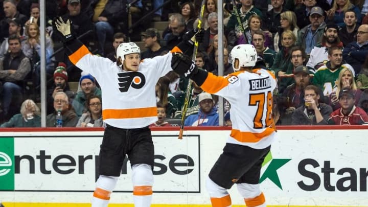 Jan 7, 2016; Saint Paul, MN, USA; Philadelphia Flyers forward Ryan White (25) celebrates his goal with forward Pierre-Edouard Bellemare (78) during the second period against the Minnesota Wild at Xcel Energy Center. Mandatory Credit: Brace Hemmelgarn-USA TODAY Sports