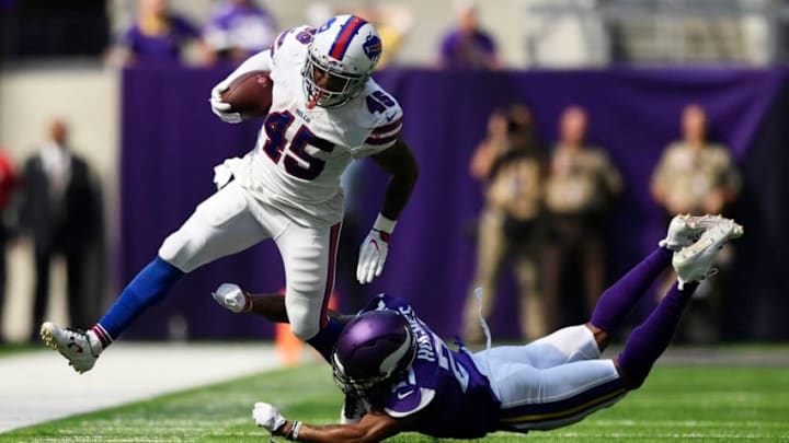 MINNEAPOLIS, MN - SEPTEMBER 23: Marcus Murphy #45 of the Buffalo Bills is knocked out of bounds by Mike Hughes #21 of the Minnesota Vikings in the first half of the game at U.S. Bank Stadium on September 23, 2018 in Minneapolis, Minnesota. (Photo by Hannah Foslien/Getty Images)