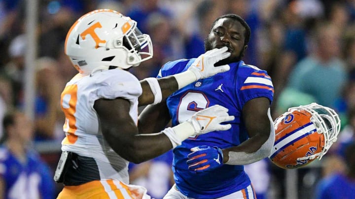 Tennessee linebacker William Mohan (18) and running back Nay’Quan Wright (6) tussle during a game at Ben Hill Griffin Stadium in Gainesville, Fla. on Saturday, Sept. 25, 2021.Kns Tennessee Florida Football