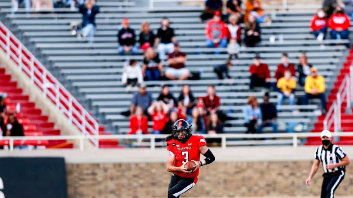 LUBBOCK, TEXAS – OCTOBER 24: Quarterback Henry Colombi #3 of the Texas Tech Red Raiders runs the ball during the first half of the college football game against the West Virginia Mountaineers on October 24, 2020 at Jones AT&T Stadium in Lubbock, Texas. (Photo by John E. Moore III/Getty Images)