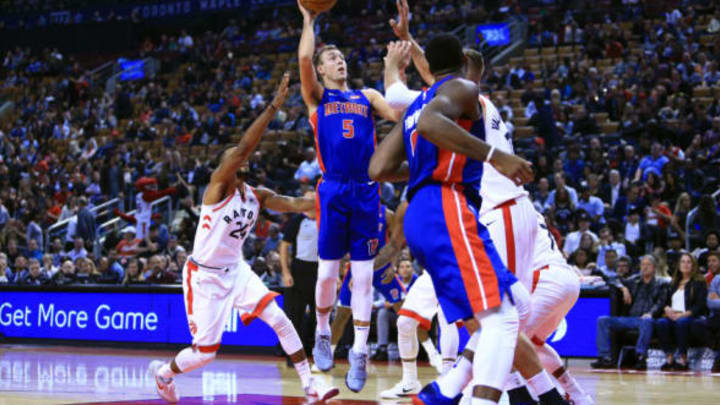 ORONTO, ON - OCTOBER 10: Luke Kennard #5 of the Detroit Pistons shoots the ball during the first half of an NBA preseason game against the Toronto Raptors at Air Canada Centre on October 10, 2017 in Toronto, Canada. NOTE TO USER: User expressly acknowledges and agrees that, by downloading and or using this photograph, User is consenting to the terms and conditions of the Getty Images License Agreement. (Photo by Vaughn Ridley/Getty Images)