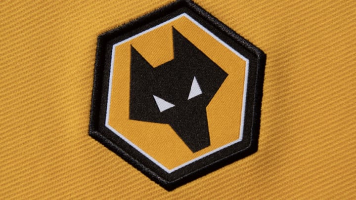 MANCHESTER, ENGLAND - MAY 3: The official Wolverhampton Wanderers FC club badge on a home shirt on May 3, 2023 in Manchester, United Kingdom. (Photo by Visionhaus/Getty Images)