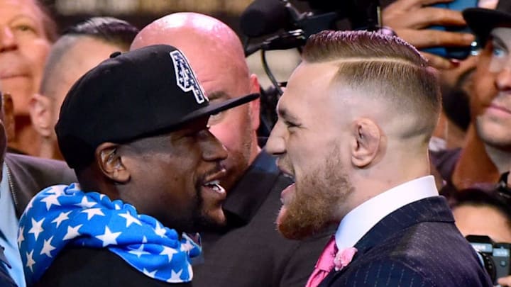 LOS ANGELES, CA - JULY 11: Floyd Mayweather Jr. and Conor McGregor stand face to face during the Floyd Mayweather Jr. v Conor McGregor World Press Tour at Staples Center on July 11, 2017 in Los Angeles, California. (Photo by Harry How/Getty Images)