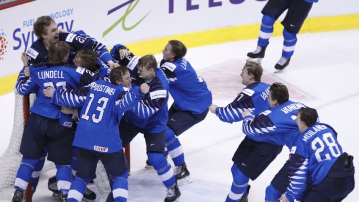 VANCOUVER , BC - JANUARY 5: Finland celebrates a victory against the United States following a gold medal game at the IIHF World Junior Championships at Rogers Arena on January 5, 2019 in Vancouver, British Columbia, Canada. (Photo by Kevin Light/Getty Images)
