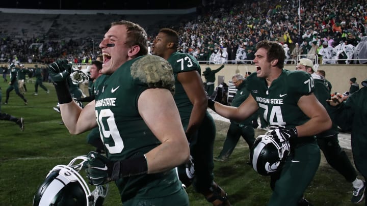 EAST LANSING, MI – NOVEMBER 04: Matt Dotson #89 of the Michigan State Spartans celebrates a 27-24 win over the Penn State Nittany Lions at Spartan Stadium on November 4, 2017 in East Lansing, Michigan. (Photo by Gregory Shamus/Getty Images)
