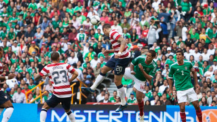 MEXICO CITY, MEXICO - AUGUST 15: Geoff Cameron of United States heads the ball during a FIFA friendly match between Mexico and US at Azteca Stadium on August 15, 2012 in Mexico City, Mexico. (Photo by Miguel Tovar/Getty Images)