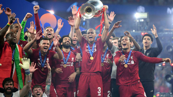 MADRID, SPAIN - JUNE 01: Fabinho of Liverpool lifts the Champions League Trophy after winning the UEFA Champions League Final between Tottenham Hotspur and Liverpool at Estadio Wanda Metropolitano on June 01, 2019 in Madrid, Spain. (Photo by Michael Regan/Getty Images)