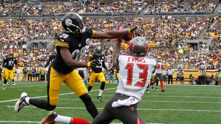PITTSBURGH, PA - SEPTEMBER 28: Mike Evans #13 of the Tampa Bay Buccaneers makes a touchdown catch in front of Cortez Allen #28 of the Pittsburgh Steelers during the first quarter at Heinz Field on September 28, 2014 in Pittsburgh, Pennsylvania. (Photo by Justin K. Aller/Getty Images)