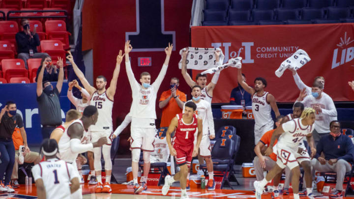 Feb 6, 2021; Champaign, Illinois, USA; The Illinois Fighting Illini bench celebrates a three point during the second half against the Wisconsin Badgers at State Farm Center. Mandatory Credit: Patrick Gorski-USA TODAY Sports