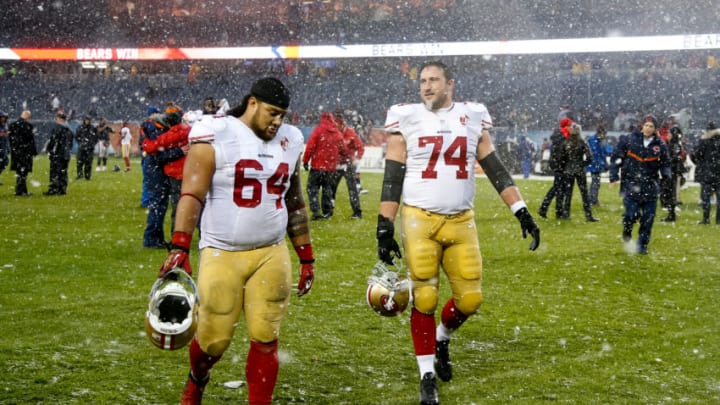 CHICAGO, IL - DECEMBER 04: Mike Purcell #64 and Joe Staley #74 of the San Francisco 49ers walks toward the locker room at the conclusion of the game against the Chicago Bears at Soldier Field on December 4, 2016 in Chicago, Illinois. The Chicago Bears defeat the San Francisco 49ers 26-6. (Photo by Joe Robbins/Getty Images)
