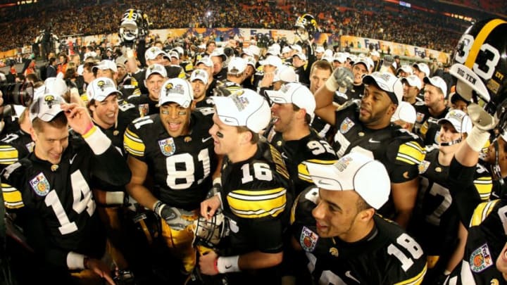 MIAMI GARDENS, FL - JANUARY 05: Tony Moeaki #81 of the Iowa Hawkeyes celebrates with his teammates after Iowa won 24-14 against the Georgia Tech Yellow Jackets during the FedEx Orange Bowl at Land Shark Stadium on January 5, 2010 in Miami Gardens, Florida. (Photo by Streeter Lecka/Getty Images)