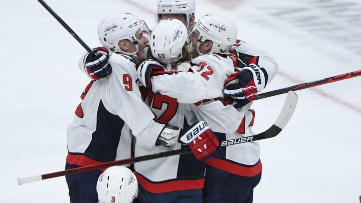 GLENDALE, ARIZONA – FEBRUARY 15: Carl Hagelin #62 of the Washington Capitals celebrates with teammates after scoring a goal in the second period against the Arizona Coyotes at Gila River Arena on February 15, 2020 in Glendale, Arizona. (Photo by Jennifer Stewart/Getty Images )