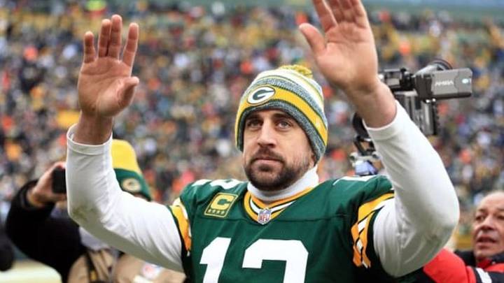 Jan 11, 2015; Green Bay, WI, USA; Green Bay Packers quarterback Aaron Rodgers (12) waves to the crowd after the 2014 NFC Divisional playoff football game against the Dallas Cowboys at Lambeau Field. Mandatory Credit: Andrew Weber-USA TODAY Sports