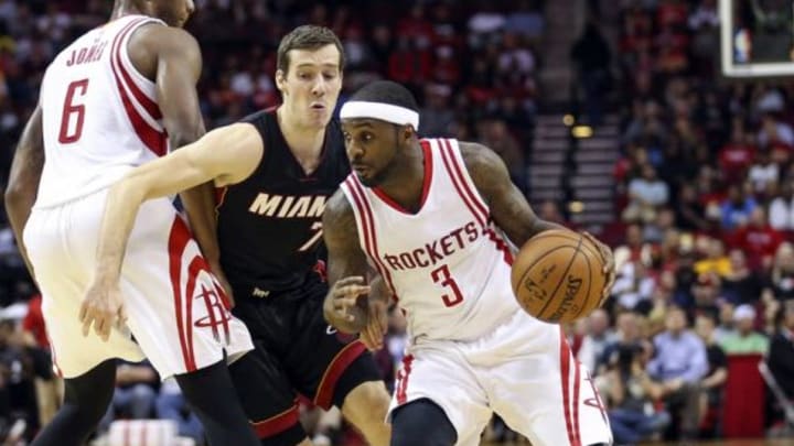 Feb 2, 2016; Houston, TX, USA; Houston Rockets guard Ty Lawson (3) dribbles the ball as Miami Heat guard Goran Dragic (7) defends during the second quarter at Toyota Center. Mandatory Credit: Troy Taormina-USA TODAY Sports