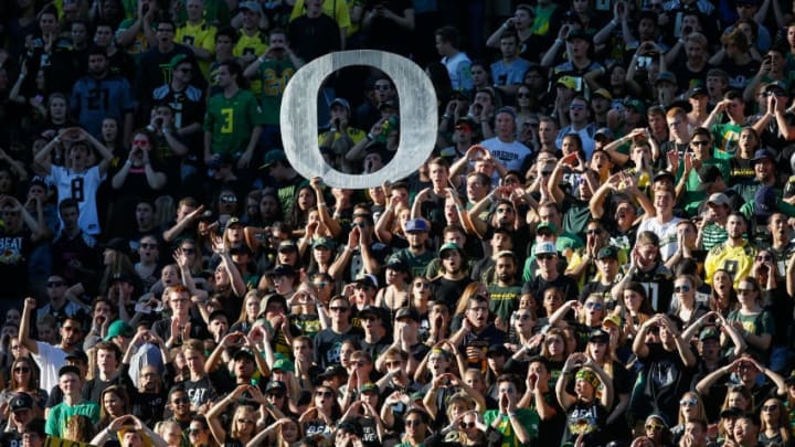 EUGENE, OR - OCTOBER 08: Oregon Ducks fans cheer during the game against the Washington Huskies on October 8, 2016 at Autzen Stadium in Eugene, Oregon. The Huskies defeated the Ducks 70-21. (Photo by Otto Greule Jr/Getty Images)