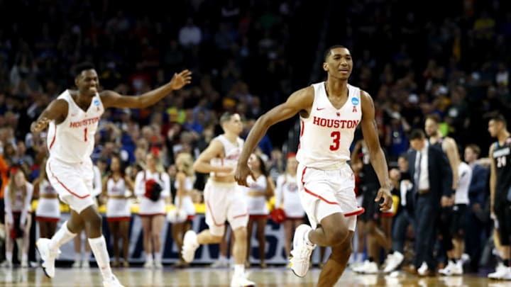 WICHITA, KS - MARCH 15: Armoni Brooks #3 and Chris Harris Jr. #1 of the Houston Cougars celebrate their teams win over the San Diego State Aztecs in the first round of the 2018 NCAA Men's Basketball Tournament at INTRUST Arena on March 15, 2018 in Wichita, Kansas. The Houston Cougars defeated the San Diego State Aztecs 67-65. (Photo by Jamie Squire/Getty Images)