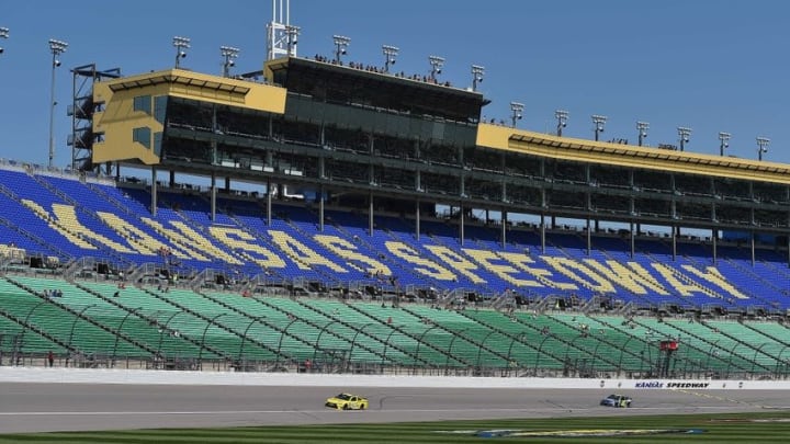 May 6, 2016; Kansas City, KS, USA; NASCAR Sprint Cup Series driver Matt Kenseth (20) and Jimmie Johnson (48) during practice of the GoBowling 400 at Kansas Speedway. Mandatory Credit: Jasen Vinlove-USA TODAY Sports