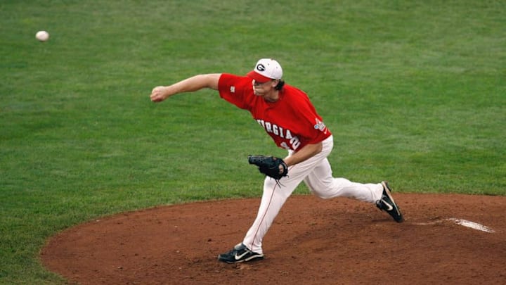 OMAHA, NE - JUNE 24: Stephen Dodson #42 of the Georgia Bulldogs delivers the pitch against the Fresno State Bulldogs during Game 2 of the 2008 Men's College World Series Championship on June 24, 2008 at Rosenblatt Stadium in Omaha, Nebraska. (Photo by Kevin C. Cox/Getty Images)