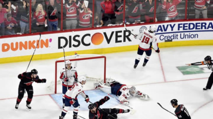 RALEIGH, NORTH CAROLINA – APRIL 22: Jordan Staal #11 of the Carolina Hurricanes celebrates with teammates after scoring a goal against Braden Holtby #70 of the Washington Capitals in the third period of Game Six of the Eastern Conference First Round during the 2019 NHL Stanley Cup Playoffs at PNC Arena on April 22, 2019 in Raleigh, North Carolina. The Hurricanes won 5-2. (Photo by Grant Halverson/Getty Images)