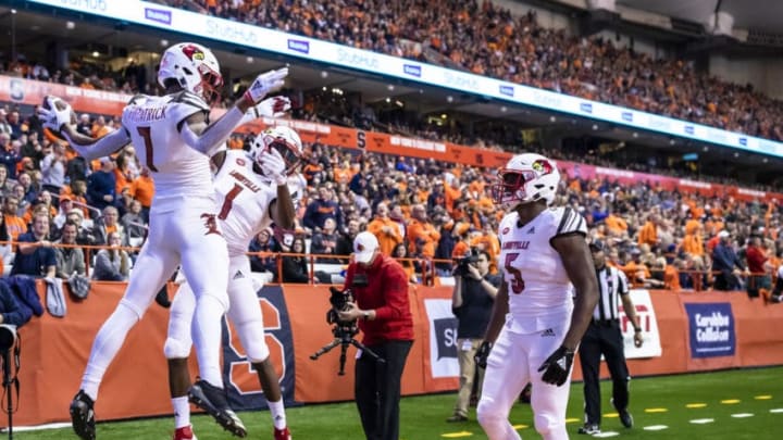 SYRACUSE, NY - NOVEMBER 09: Dez Fitzpatrick #7 of the Louisville Cardinals celebrates a touchdown with Tutu Atwell #1 of the Louisville Cardinals during the second quarter against the Syracuse Orange at the Carrier Dome on November 9, 2018 in Syracuse, New York. (Photo by Brett Carlsen/Getty Images)